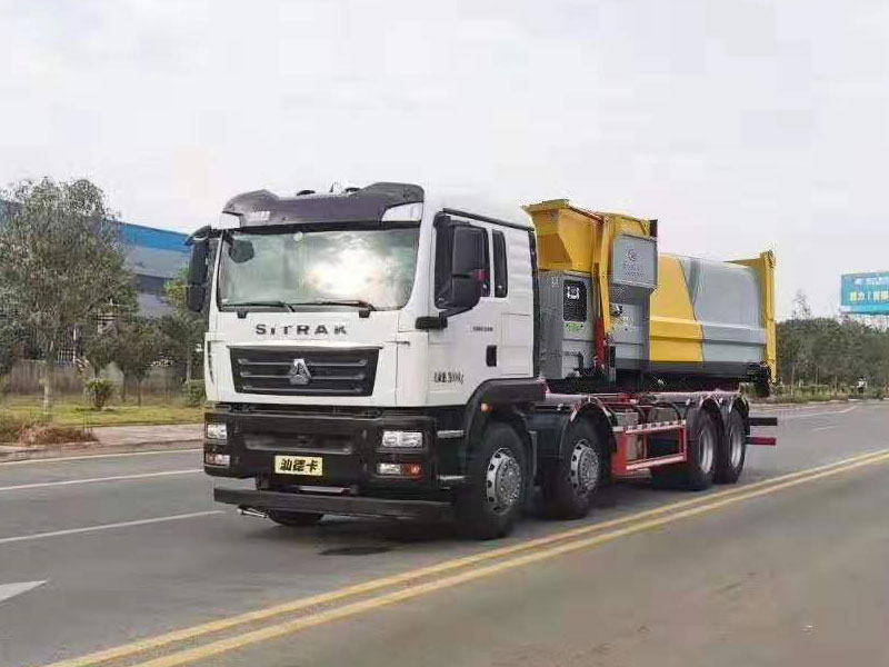 國六重汽汕德卡前四后八勾臂垃圾車